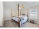 Bedroom with a four-poster bed and ceiling fan at 3842 Monticello St, Douglasville, GA 30135