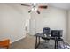 Bedroom featuring a ceiling fan, neutral paint, and a desk/work area at 3842 Monticello St, Douglasville, GA 30135