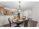 Open concept view of kitchen, dining and entry hallway at 3842 Monticello St, Douglasville, GA 30135
