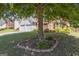 Well-manicured front yard with a large shade tree enhances this two story home's curb appeal at 3842 Monticello St, Douglasville, GA 30135