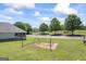 Community playground with swings surrounded by lush greenery, perfect for outdoor activities at 3842 Monticello St, Douglasville, GA 30135