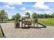 Community playground with various play structures provides a fun and safe environment for  at 3842 Monticello St, Douglasville, GA 30135