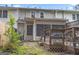 Fenced backyard featuring a wooden deck and a ground level covered patio at 244 Timber Creek Ln, Marietta, GA 30060