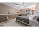 Modest bedroom featuring a ceiling fan, wall to wall carpeting, and a window at 244 Timber Creek Ln, Marietta, GA 30060