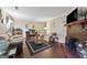 Inviting living room with a classic brick fireplace, wood floors, and cozy seating arrangement at 244 Timber Creek Ln, Marietta, GA 30060