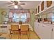 Practical kitchen area with dining nook, white cabinets, and efficient layout at 270 E James Cir, Hampton, GA 30228