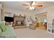 Cozy living room showcasing a brick fireplace and comfortable seating at 270 E James Cir, Hampton, GA 30228