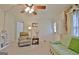 Spacious living room with neutral carpet and view into another room at 270 E James Cir, Hampton, GA 30228