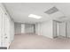 Large, carpeted basement area with neutral paint, recessed lighting, and plenty of space at 40 Wenham Ln, Sharpsburg, GA 30277