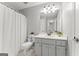 Charming bathroom with a single vanity, toilet, and shower, offering a clean and functional space at 40 Wenham Ln, Sharpsburg, GA 30277