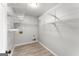 Walk-in closet with built-in shelving for maximum storage and organization at 40 Wenham Ln, Sharpsburg, GA 30277