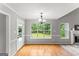 Light-filled dining area features backyard access and ample natural light at 40 Wenham Ln, Sharpsburg, GA 30277