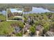 Luxury home aerial view showcasing a backyard pool; ideally nestled near scenic lake views in a desirable neighborhood at 113 Regents Sq, Peachtree City, GA 30269