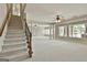 Expansive basement featuring stairs, columns, natural light, and endless possibilities at 113 Regents Sq, Peachtree City, GA 30269
