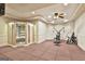 Basement exercise room featuring a sauna and various exercise machines at 113 Regents Sq, Peachtree City, GA 30269