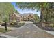 Stunning two-story home with a beautiful brick driveway and lush landscaping at 113 Regents Sq, Peachtree City, GA 30269