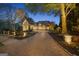 Beautiful exterior view of home with a long driveway and mature landscaping at 113 Regents Sq, Peachtree City, GA 30269