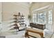 Comfortable office space with natural light, built-in shelving, and neutral decor at 113 Regents Sq, Peachtree City, GA 30269