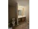 Bathroom featuring a toilet and single sink vanity with tile floors at 1110 Saint Phillips Ct, Locust Grove, GA 30248
