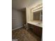 Bathroom featuring a single sink vanity with tile floors at 1110 Saint Phillips Ct, Locust Grove, GA 30248