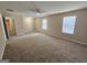 Spacious bedroom with carpeted floors and neutral colored walls at 1110 Saint Phillips Ct, Locust Grove, GA 30248