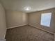 Bedroom featuring carpeted floors and neutral colored walls at 1110 Saint Phillips Ct, Locust Grove, GA 30248