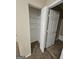 Open closet with white shelves at 1110 Saint Phillips Ct, Locust Grove, GA 30248