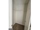 Walk-in closet with carpet and white shelves at 1110 Saint Phillips Ct, Locust Grove, GA 30248