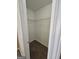 Walk-in closet with ample shelving and carpeted flooring at 1110 Saint Phillips Ct, Locust Grove, GA 30248