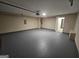 Bright and spacious garage with epoxy flooring offering ample space at 1110 Saint Phillips Ct, Locust Grove, GA 30248