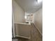 Upstairs hallway with carpeted floors at 1110 Saint Phillips Ct, Locust Grove, GA 30248