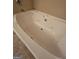 Close up of the jetted tub in the bathroom at 1110 Saint Phillips Ct, Locust Grove, GA 30248