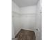 Walk-in closet featuring neutral carpet and a wire shelving system at 1110 Saint Phillips Ct, Locust Grove, GA 30248