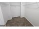 Walk-in closet with white wire shelving at 1110 Saint Phillips Ct, Locust Grove, GA 30248