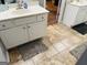 Bathroom featuring single sink, neutral walls, and tile flooring at 789 Winbrook Dr # 1, Mcdonough, GA 30253