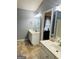 Bathroom featuring double sinks, vanity, and tile floor at 789 Winbrook Dr # 1, Mcdonough, GA 30253