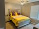 Bright bedroom with decorative ceiling fan at 789 Winbrook Dr # 1, Mcdonough, GA 30253