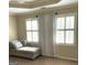 This bedroom has a neutral color scheme with large windows and plantation shutters at 30 Highlands Ln, Oxford, GA 30054