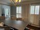 Bright dining room with shuttered windows and stylish décor, perfect for entertaining at 30 Highlands Ln, Oxford, GA 30054