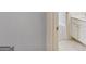 Bathroom features white cabinets and neutral flooring at 1500 Royce Dr, Locust Grove, GA 30248