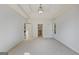 Bright and airy bedroom features a tray ceiling, neutral paint, and carpet, creating a serene and inviting space at 1500 Royce Dr, Locust Grove, GA 30248