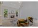 Comfortable living area with a cozy fireplace and access to the outdoor deck at 1500 Royce Dr, Locust Grove, GA 30248