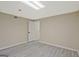 The basement includes finished space with an open doorway leading to other rooms at 3290 Ebenezer Se Rd, Conyers, GA 30094