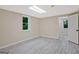 The basement includes a finished space with a window providing natural light at 3290 Ebenezer Se Rd, Conyers, GA 30094