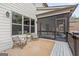 Inviting screened patio features seating and outdoor living space at 157 Waterlace Way, Fayetteville, GA 30215