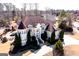 An aerial view of a grand home featuring manicured lawns and a circular driveway at 1214 Greenridge Ln, Lithonia, GA 30058