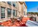 Red brick home with a spacious outdoor deck area, perfect for entertaining and outdoor gatherings at 1214 Greenridge Ln, Lithonia, GA 30058