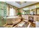 Luxurious bathroom with soaking tub, vanity, and marble floors at 1214 Greenridge Ln, Lithonia, GA 30058