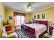 Bedroom featuring carpet, ceiling fan and dark furnishings at 1214 Greenridge Ln, Lithonia, GA 30058