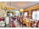 Formal dining room with hardwood floors, chandelier, and elegant table setting at 1214 Greenridge Ln, Lithonia, GA 30058